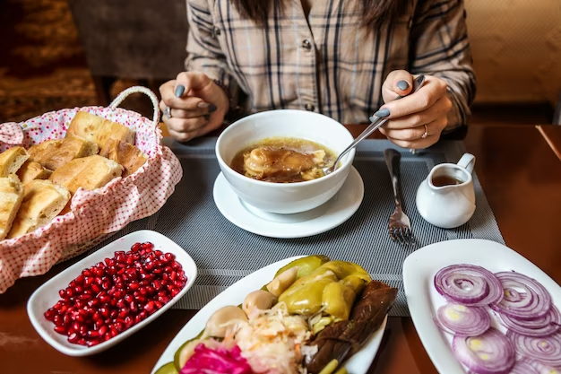 A girl is eating in a cafe