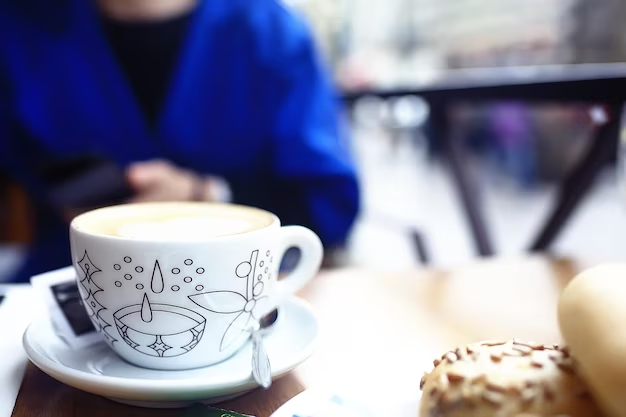 Coffee Cup with Blurred Person in the Background