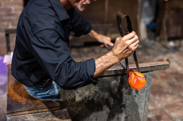 Man crafting handmade glassware