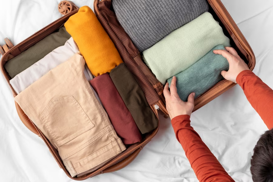 Woman packing her suitcase