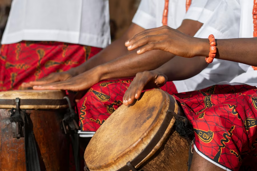 Camera zoomed in on drum-playing hands