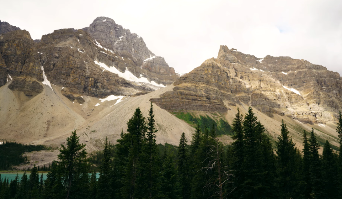 croftfoot glacier- mountains with ice, trees and lake below