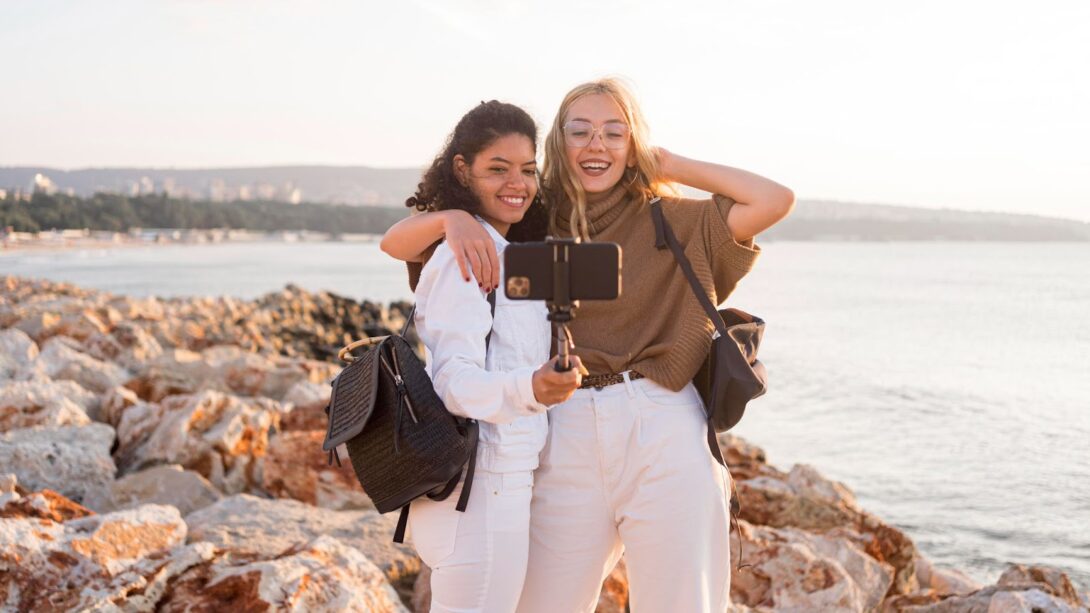 Two girls taking selfies