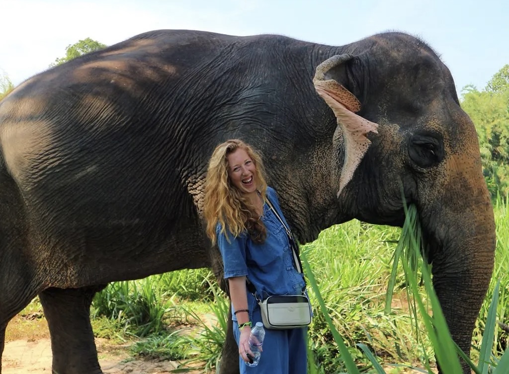 Candice Walsh next to an elephant